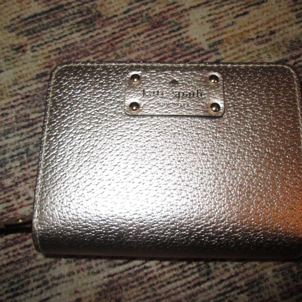 Kate Spade New with tag Gold wallet